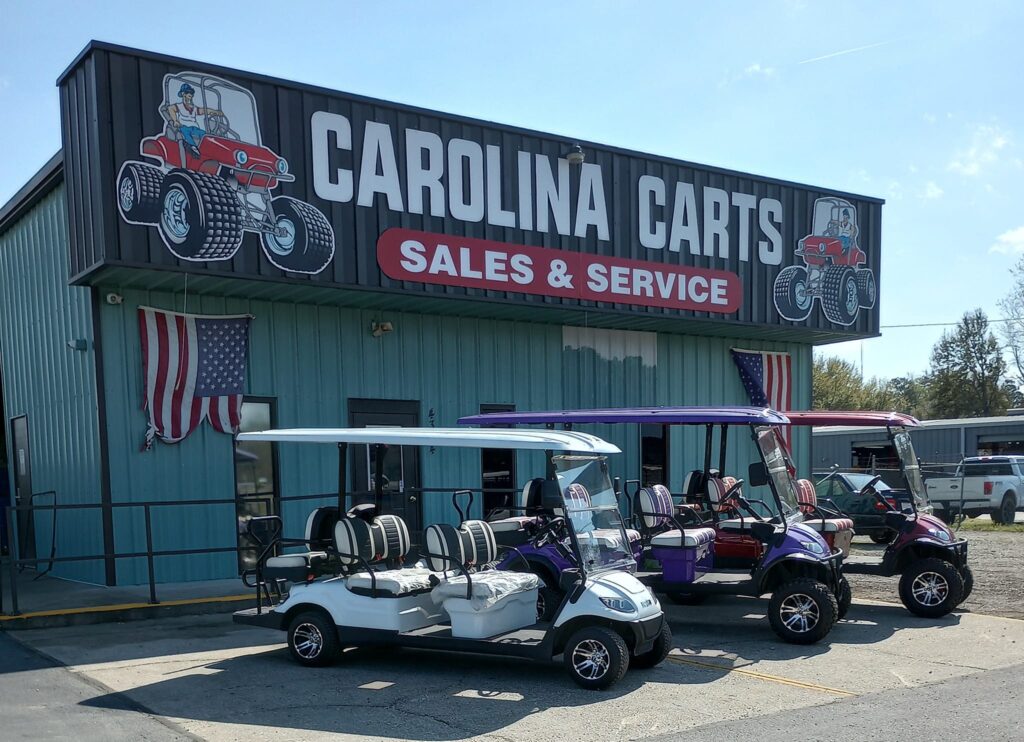 Front exterior of Jimmy’s Carolina Carts dealership with multiple golf carts displayed outside in Florence, South Carolina